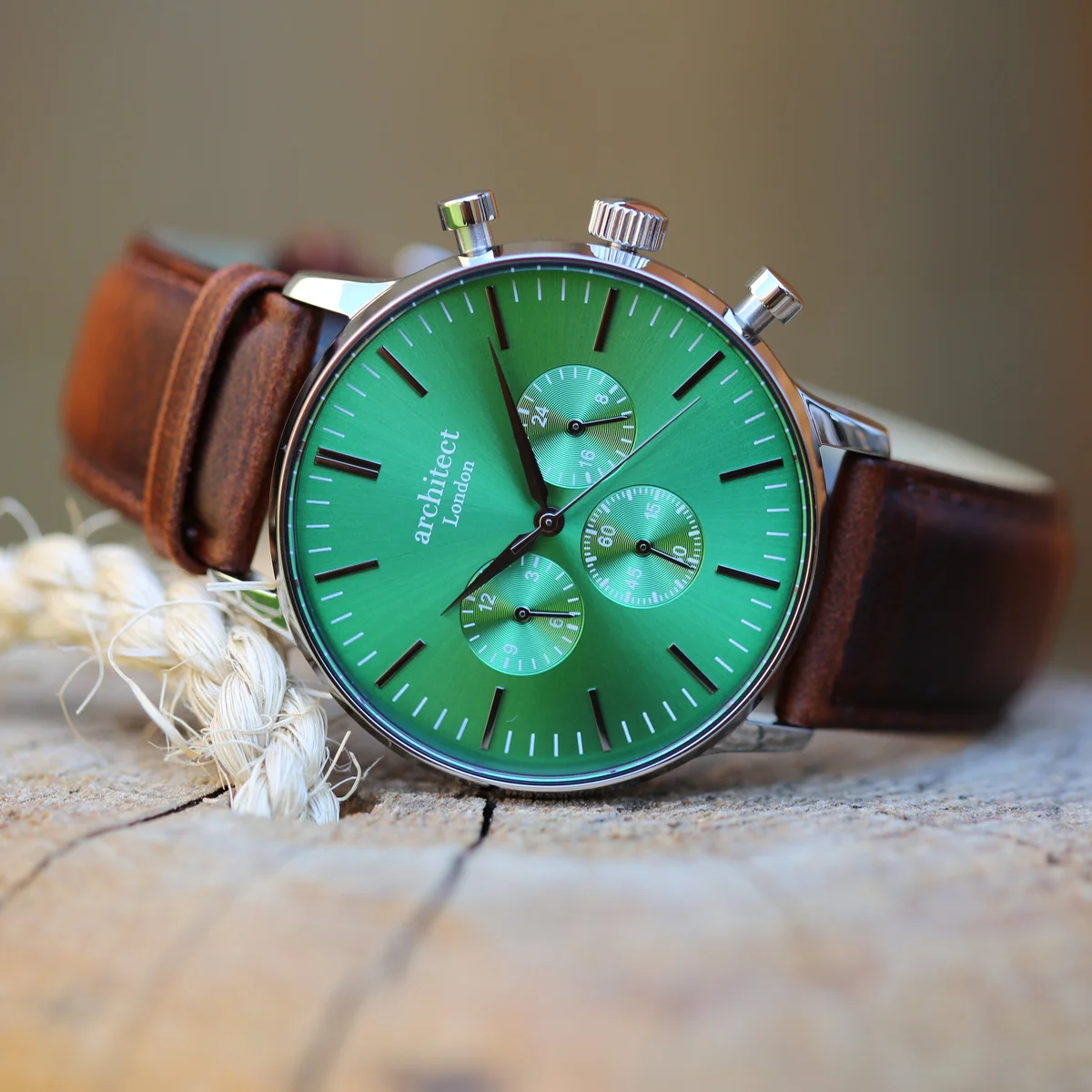 Chronograph men's watch with envy green dial, three subdials, polished stainless steel case, and walnut leather strap
