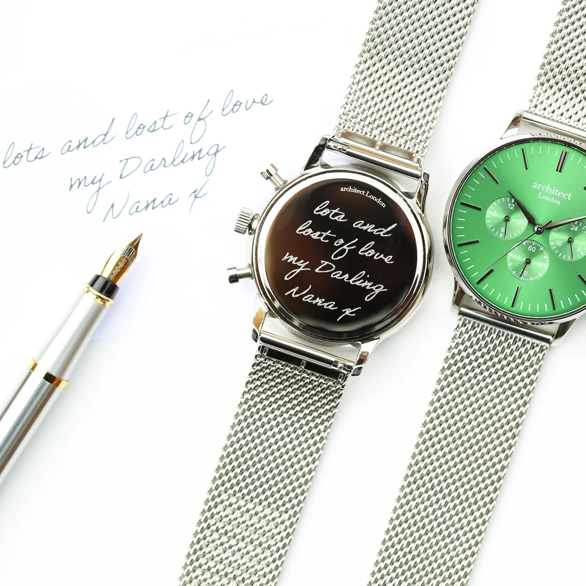 Engraved men's watch with green dial, silver Milanese mesh strap, three chronograph subdials, and polished steel case