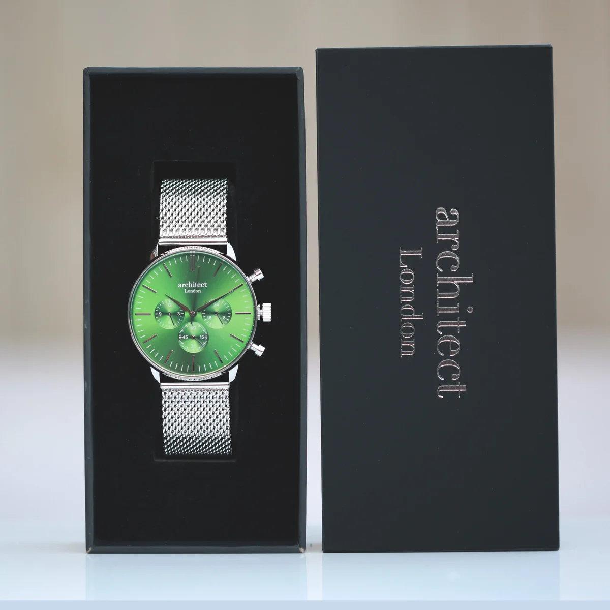 Men's personalised watch with green dial, silver Milanese mesh strap, chronograph subdials, and handwriting engraving space