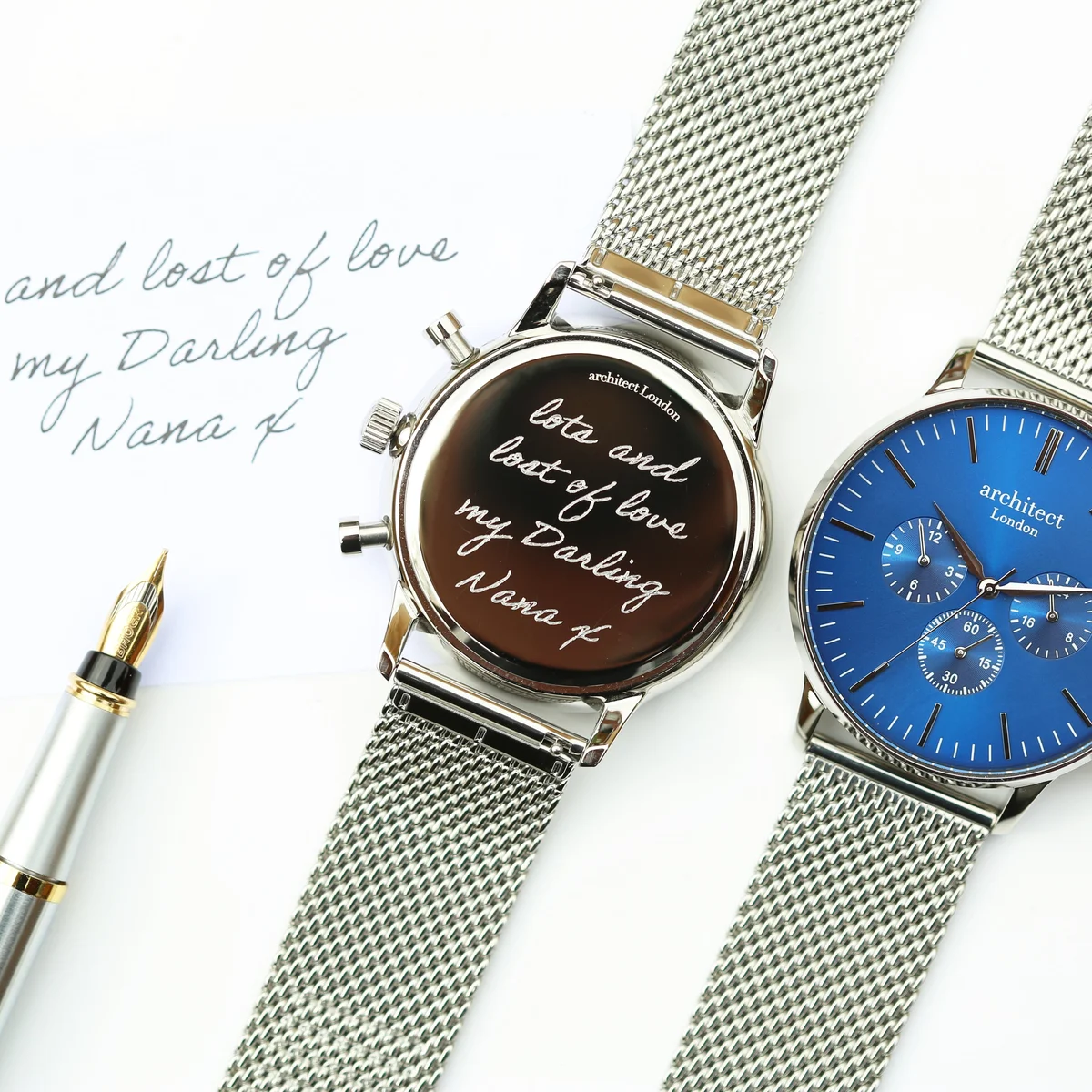 Personalised men's watch with deep blue dial, silver Milanese mesh strap, three chronograph subdials, and engraving area