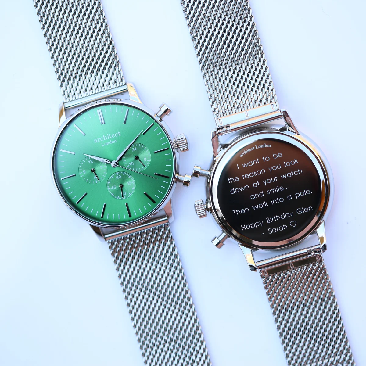 Architect Motivator watch in envy green with silver Milanese mesh strap and three chronograph subdials on white background
