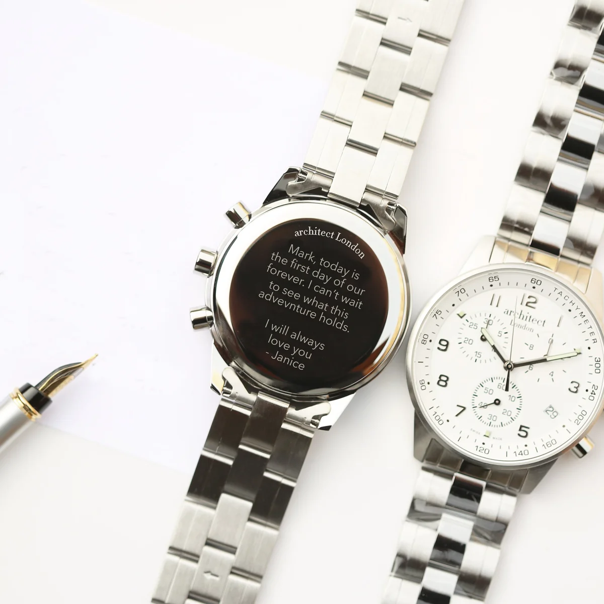 Swiss Made men's stainless steel watch with chronograph dials and modern font engraving on the back, 41mm dial diameter