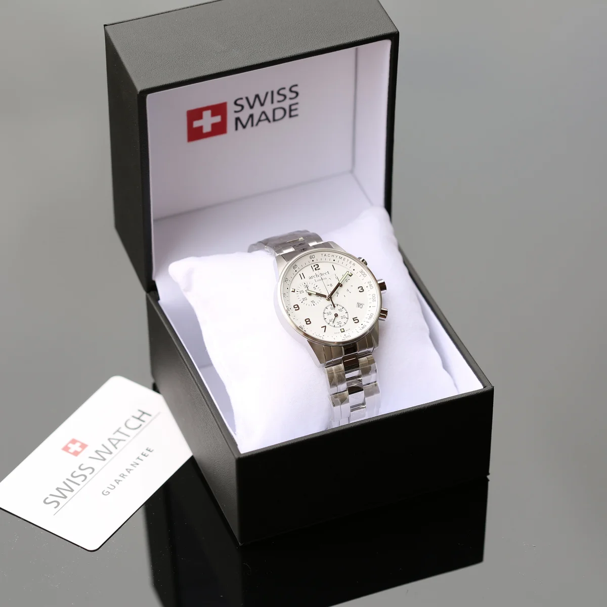 Swiss Made men's stainless steel watch with chronograph dials, sapphire glass, and engraving area shown on back case