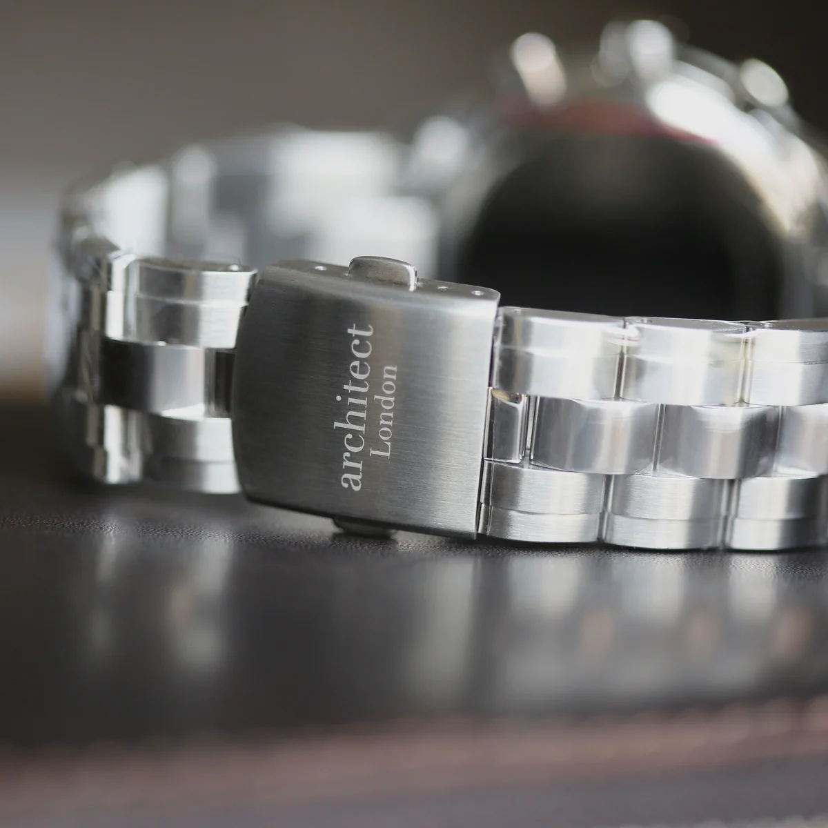Swiss made men's watch Architect Endeavour with stainless steel band, chronograph dials, and sapphire coated glass displayed in box