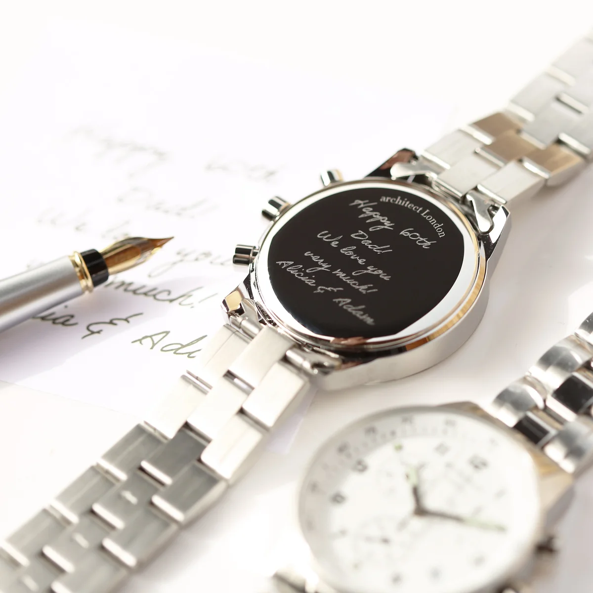 Swiss made men's watch Architect Endeavour with stainless steel band and large engravable back, shown in luxury watch box