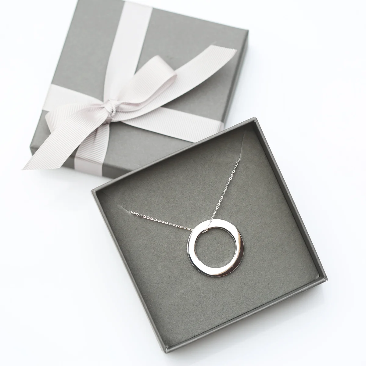 Modern silver necklace with a 32mm engraved sterling silver halo pendant on a 42cm Italian-made chain in gift box