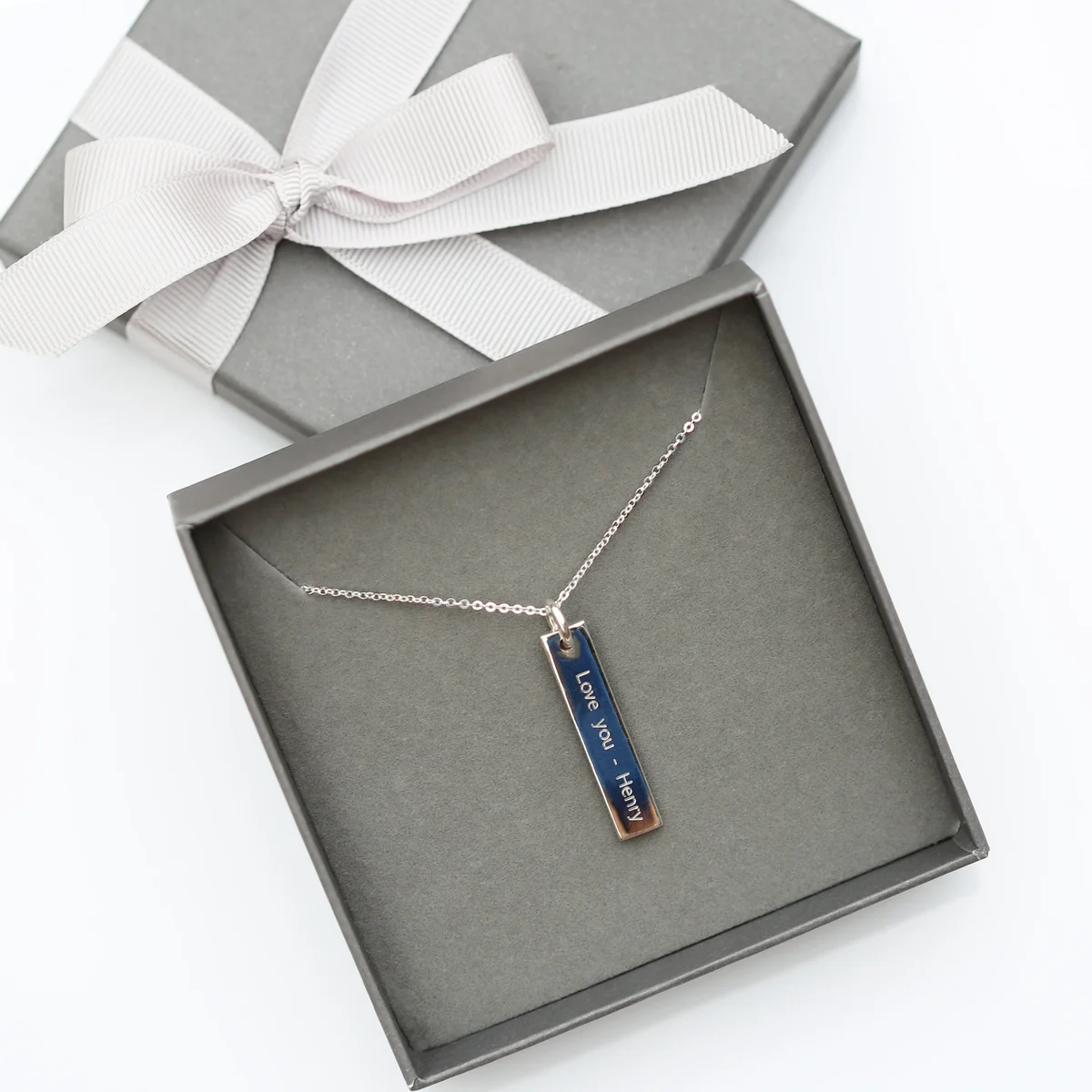 Sterling silver bar pendant necklace with fine Italian chain and modern engraved font on 7mm by 35mm bar