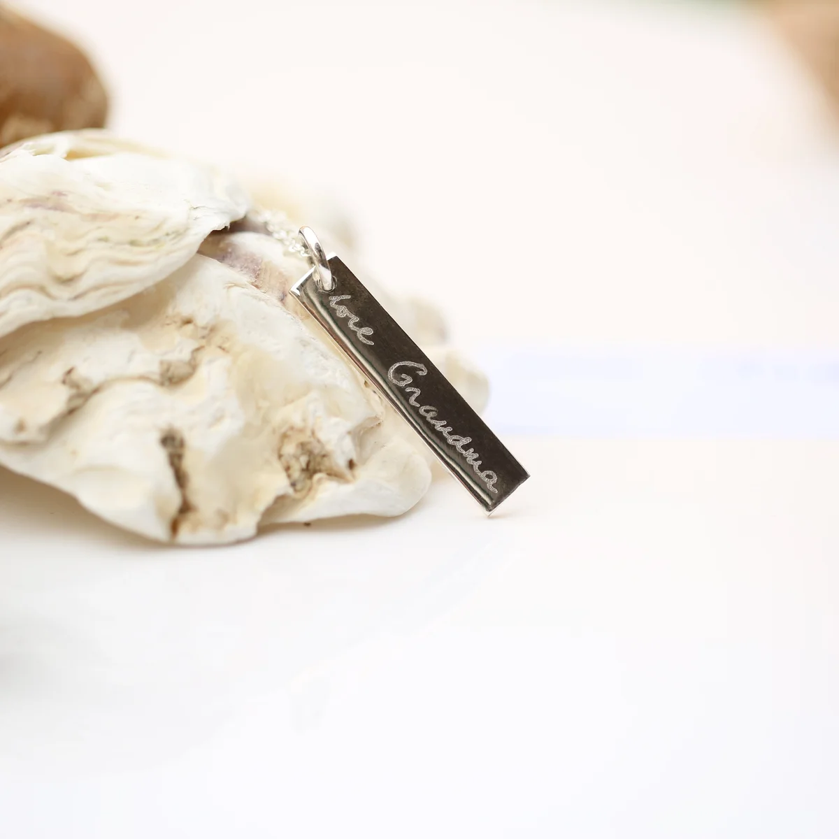 925 sterling silver jewellery bar pendant necklace with handwriting engraving on 7 mm × 35 mm bar, on a fine silver chain