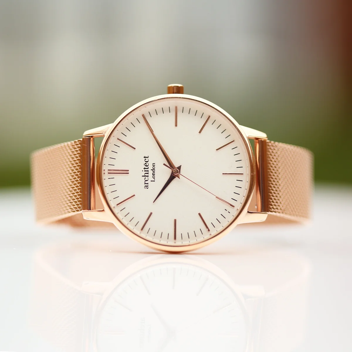 Personalised ladies watch with rose gold mesh strap and stainless steel case, minimalist white dial, handwriting engraving on back