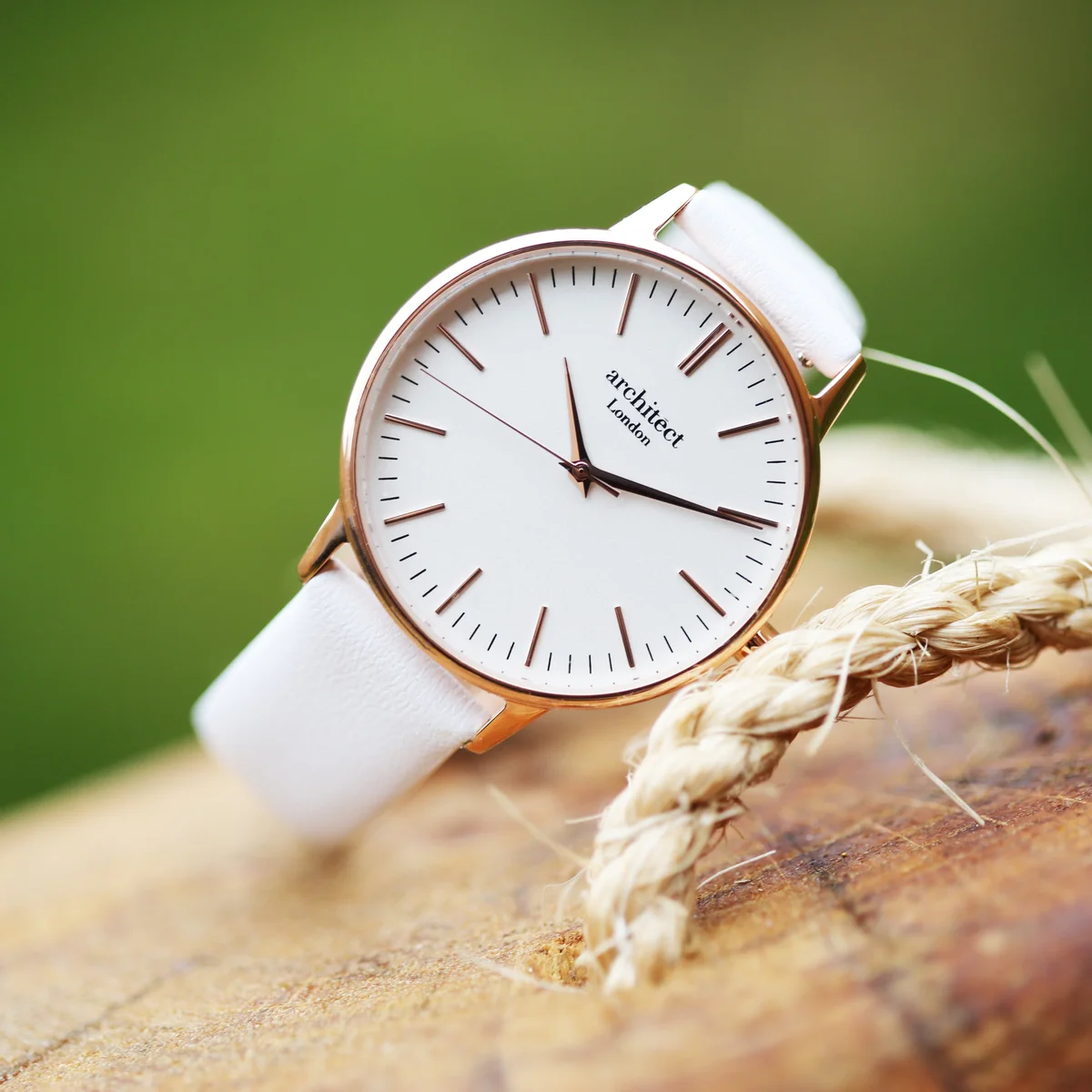 Ladies Architect Blanc watch with white leather strap, stainless steel case, and minimalist white dial with quartz movement