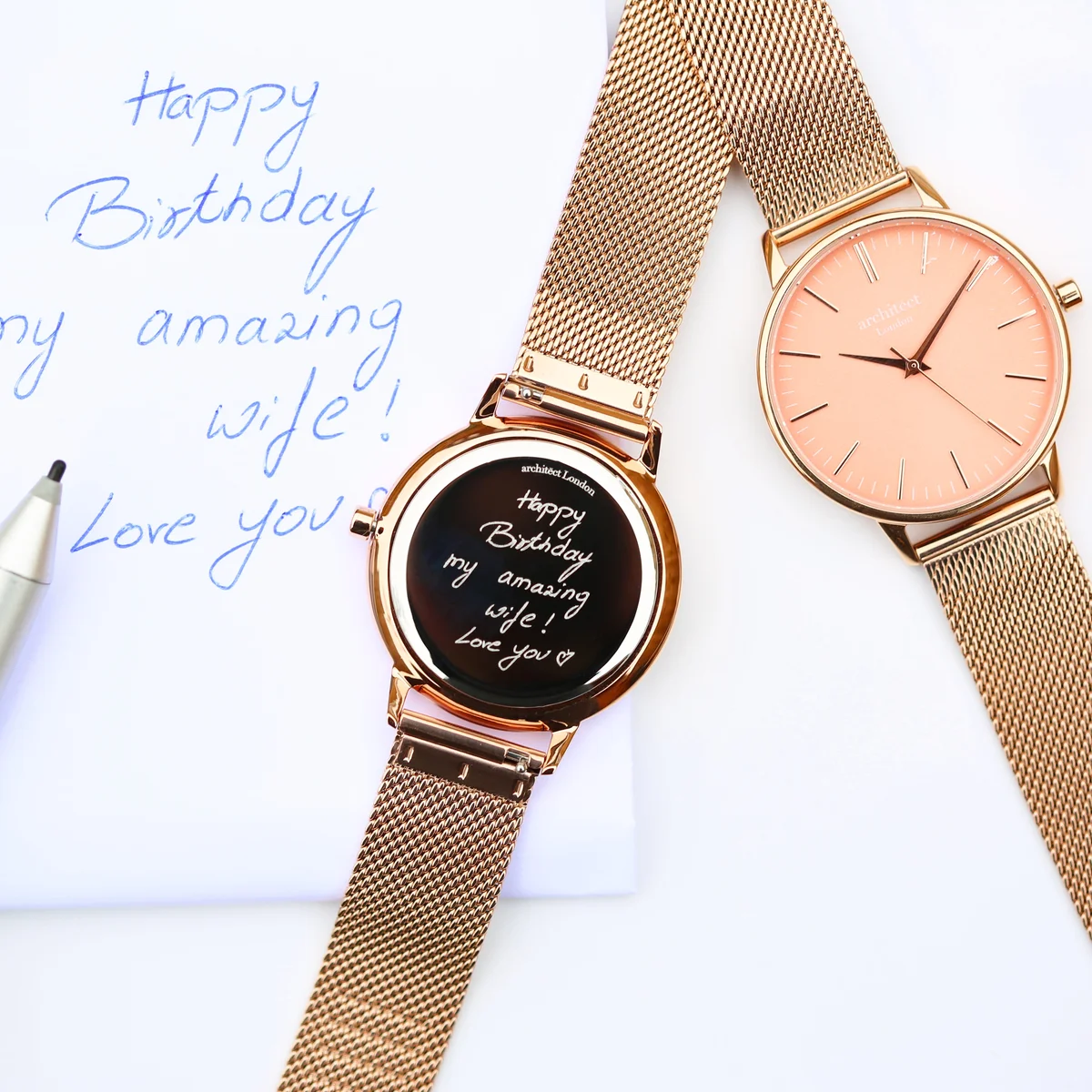 Personalised ladies watch with coral dial, rose gold mesh strap and custom handwriting engraving on stainless steel case back