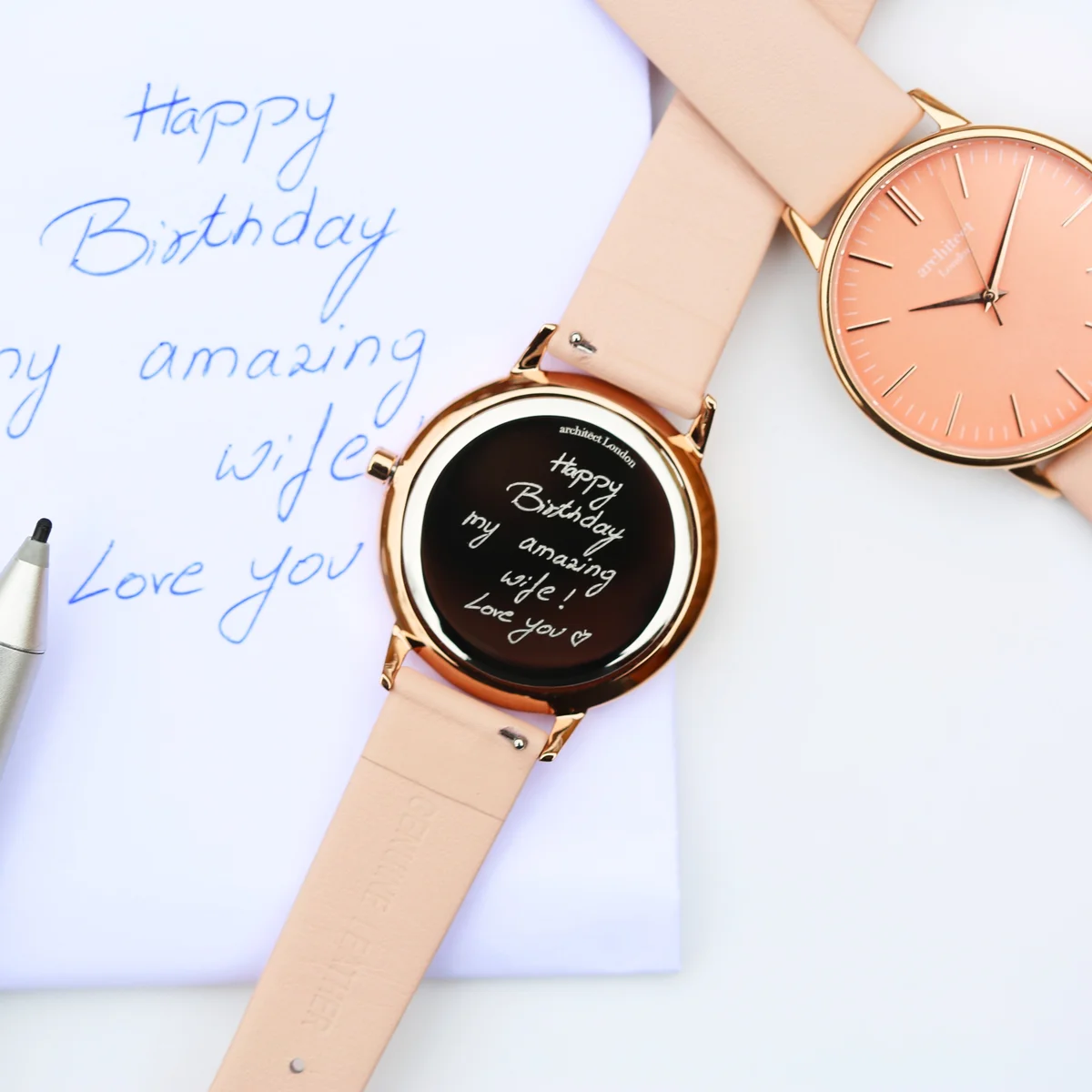 Ladies Architēct Coral quartz movement watch with apricot coral dial and light pink genuine leather strap on white background