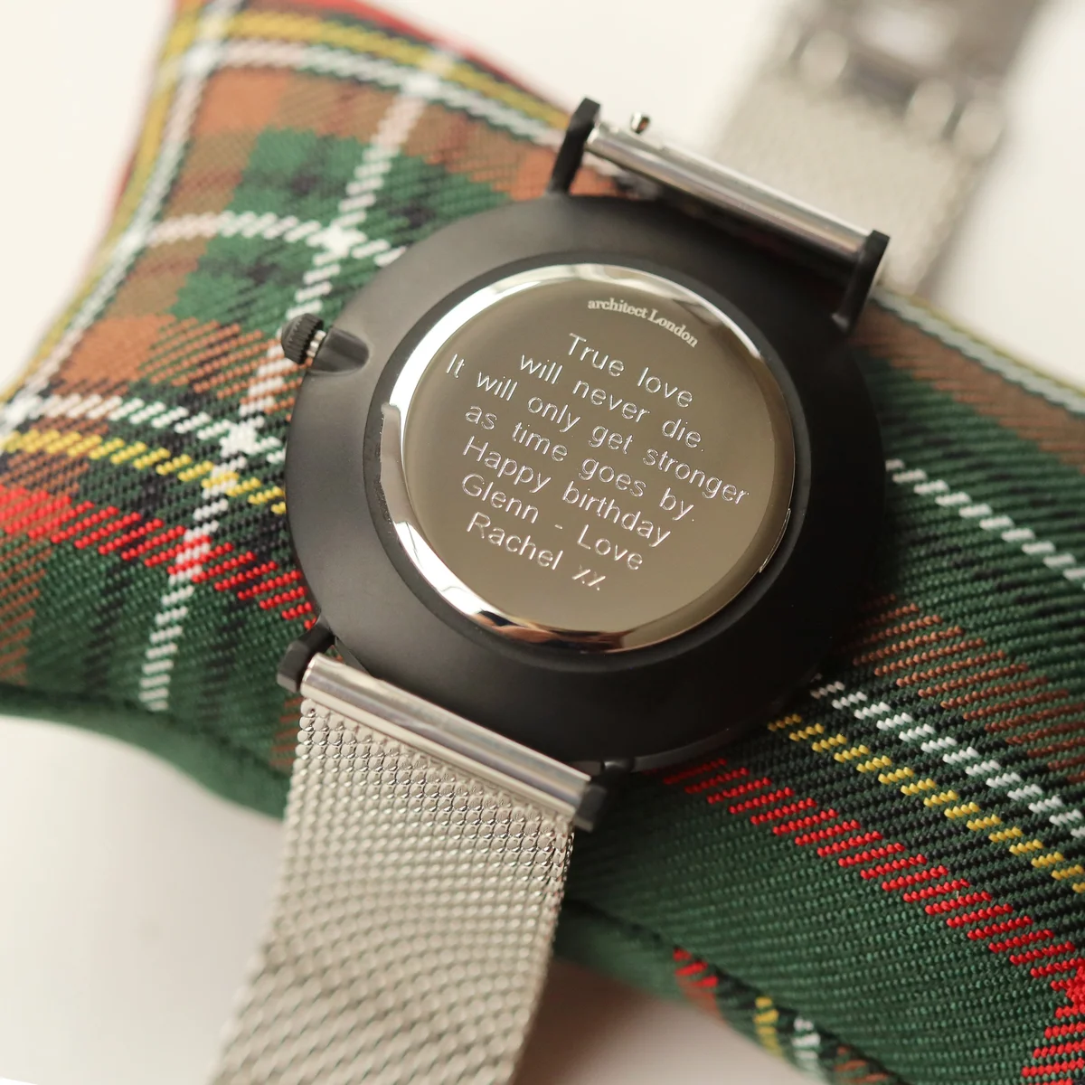 Men’s minimalist stainless steel watch with silver mesh strap and modern font engraving space on the back
