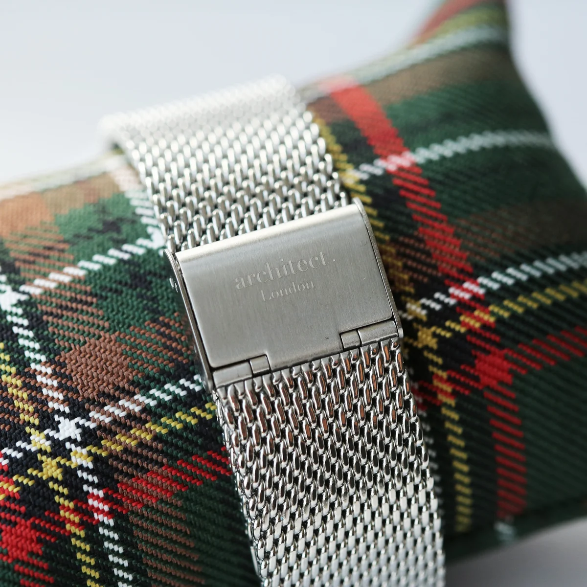 Men’s minimalist engraved quartz watch with silver mesh strap and modern font engraving on stainless steel case back