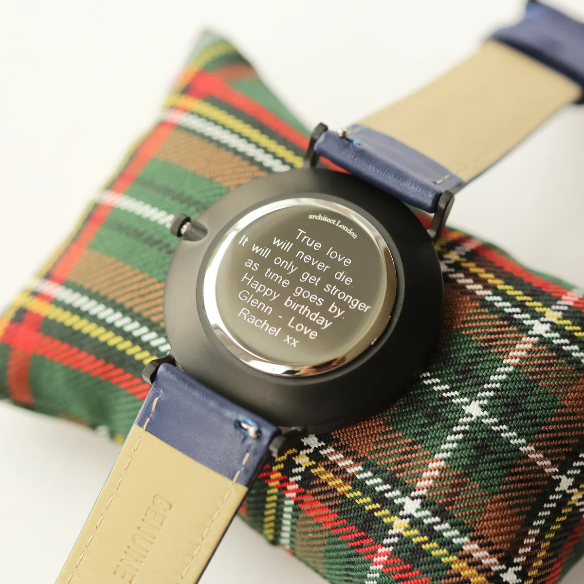 Men's minimalist watch with sandblasted gunmetal stainless steel case and admiral blue genuine leather strap on white background