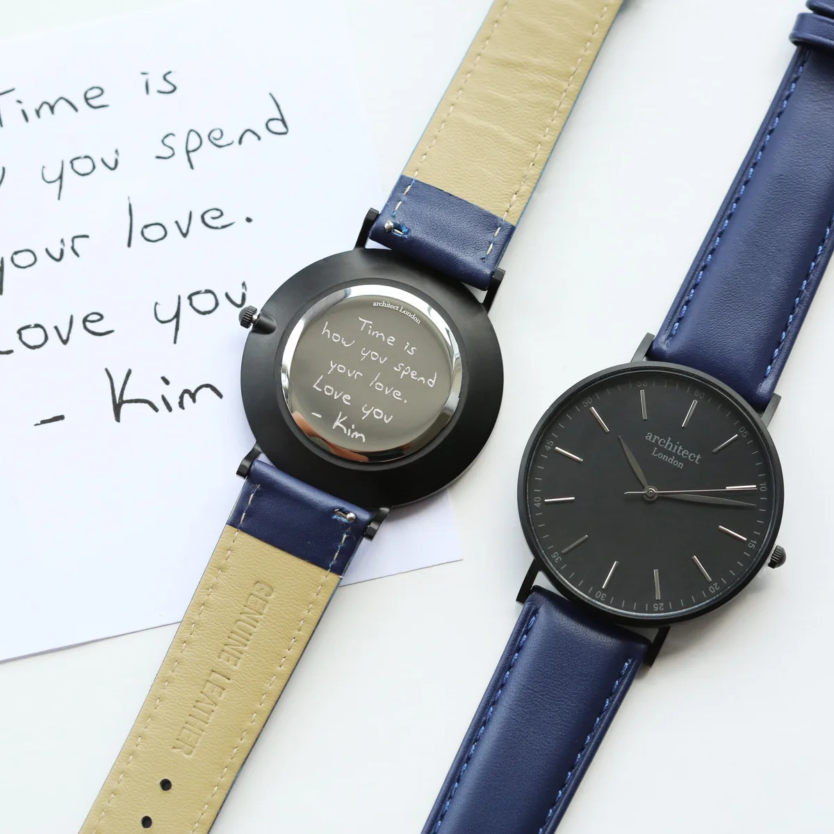 Personalised men's watch with minimalist dial, admiral blue leather strap, brushed stainless steel case on white background