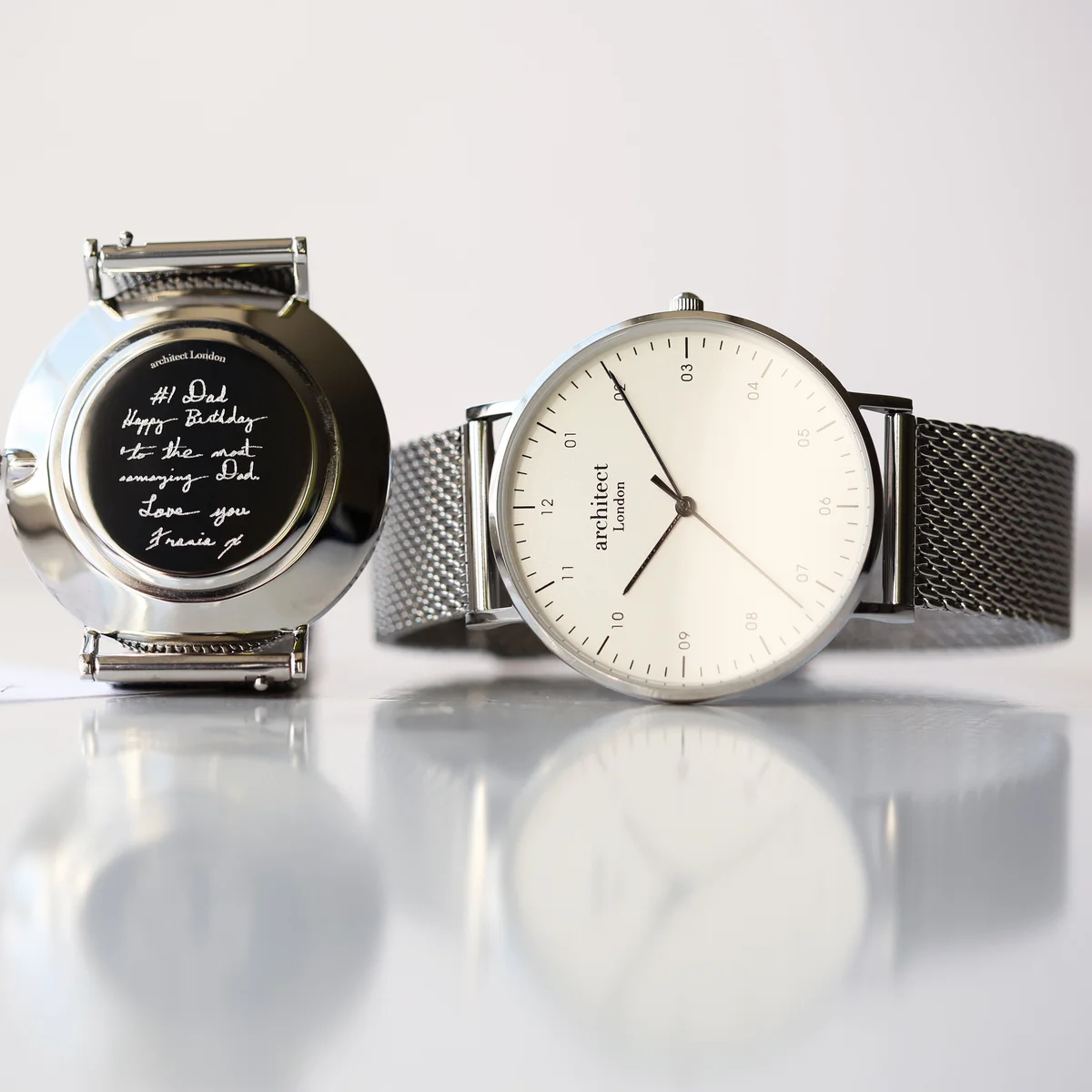 Architect Zephyr watch with polished stainless steel case and silver mesh strap shown on a white background
