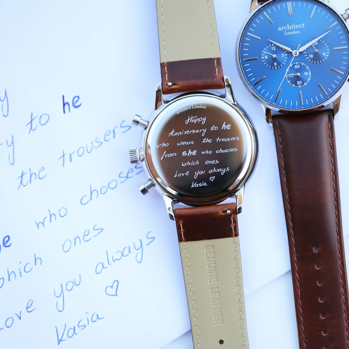 Deep-space blue dial leather strap watch with three chronograph subdials and polished stainless steel case