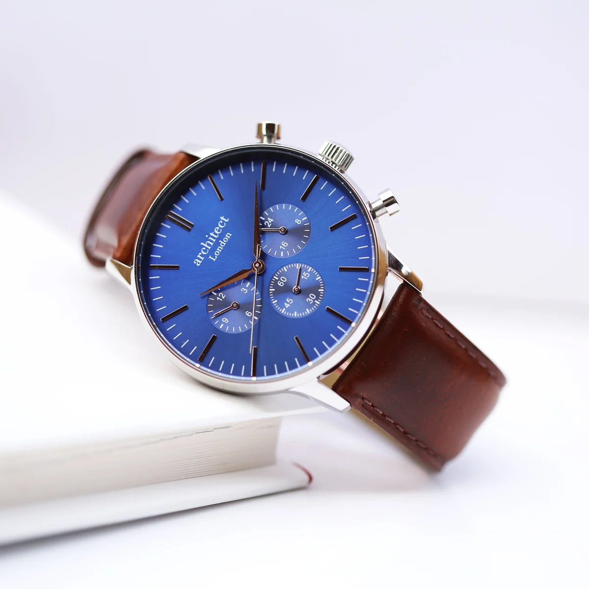 Men’s personalised watch with deep-space blue dial, walnut brown leather strap, and three chronograph subdials