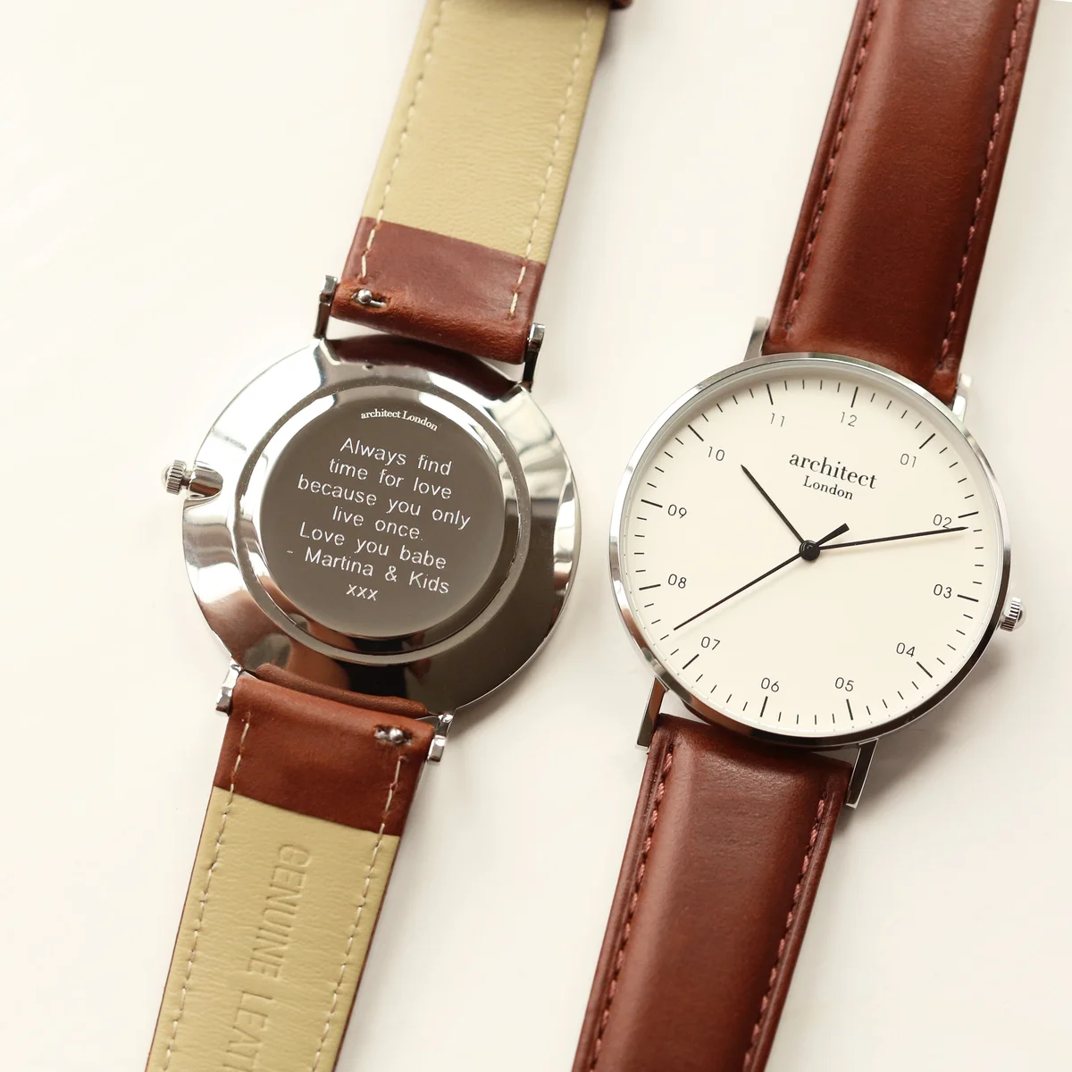 Men’s minimalist leather strap watch with walnut leather band and brushed gunmetal stainless steel case on white background