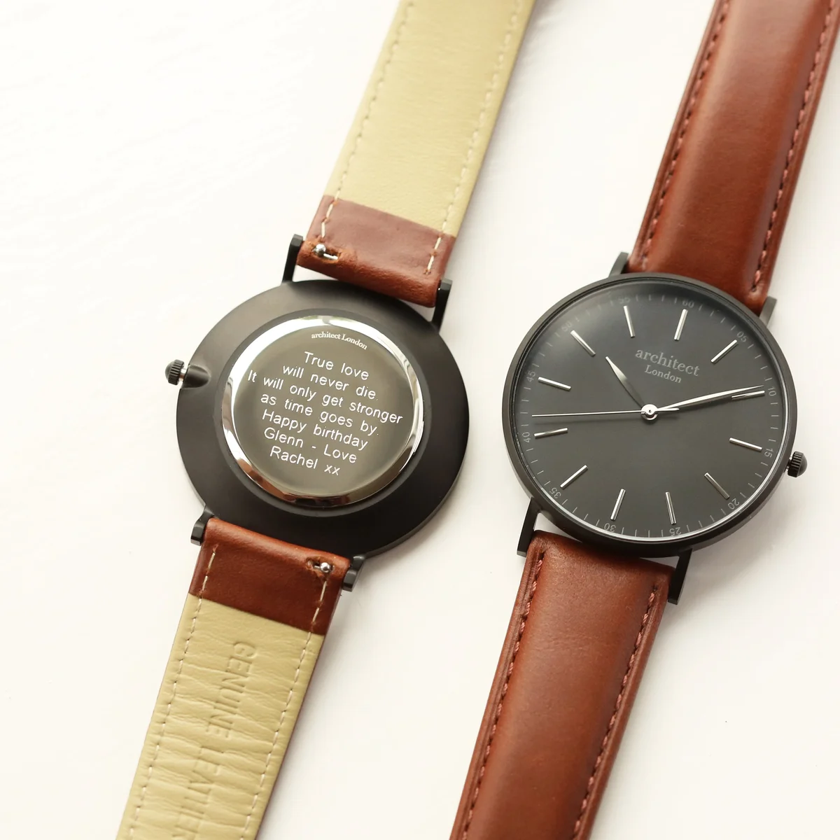 Men's minimalist watch with walnut leather strap, gunmetal stainless steel case, and modern font engraving option