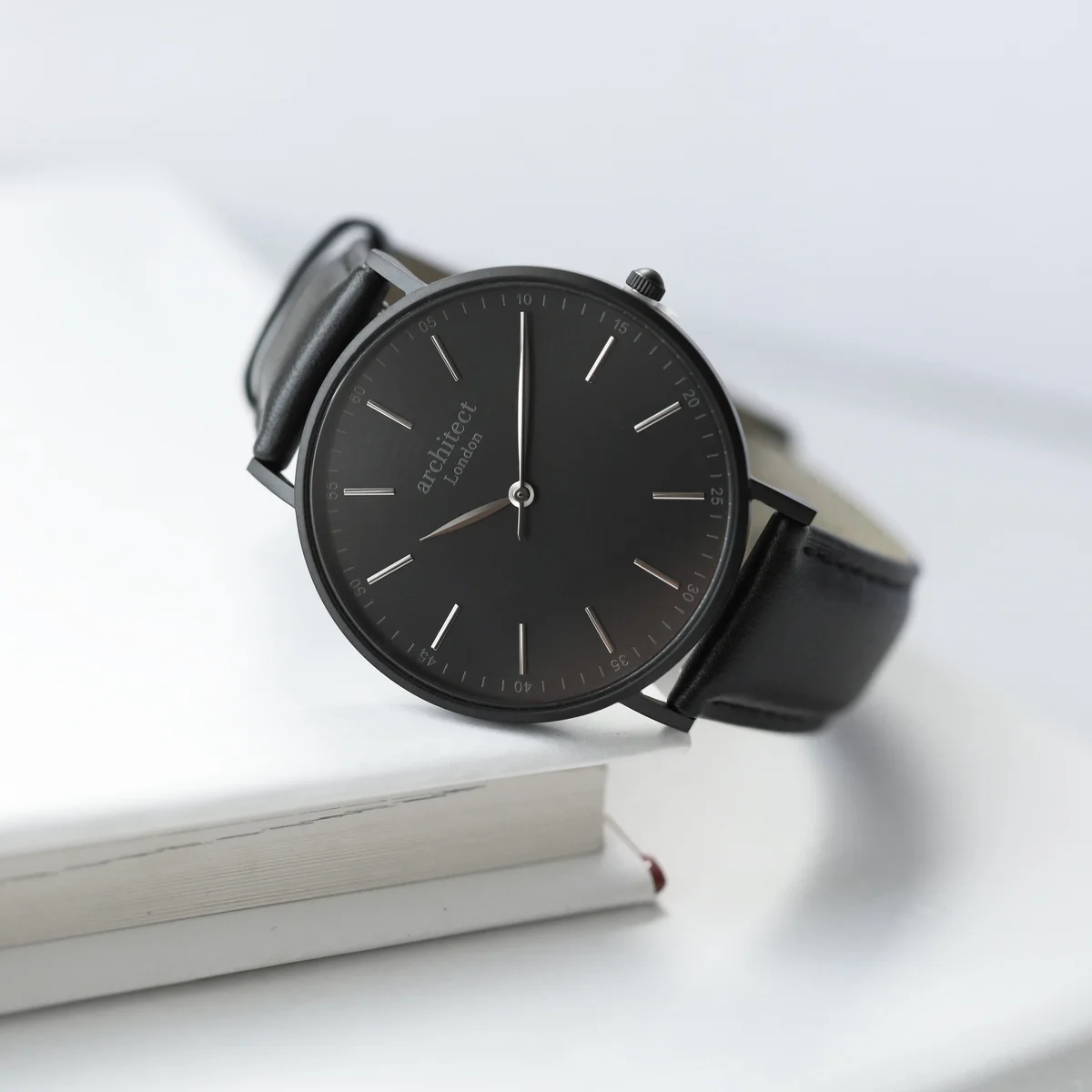 Engraved men's watch with modern font on stainless steel case and black genuine leather strap in luxury box