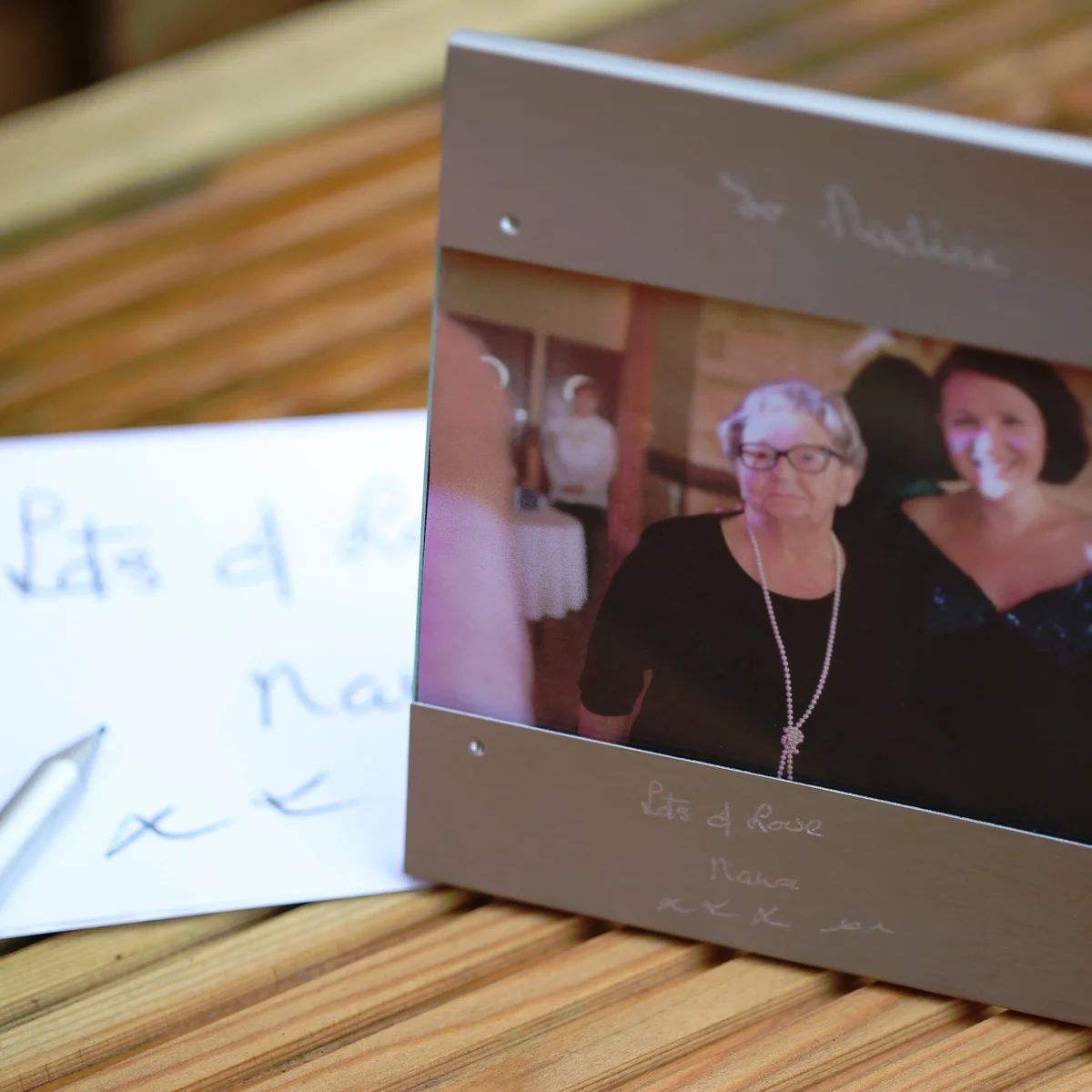 Brushed stainless steel engraved photo frame with personalised handwriting engraving and space for a 125x80mm photo