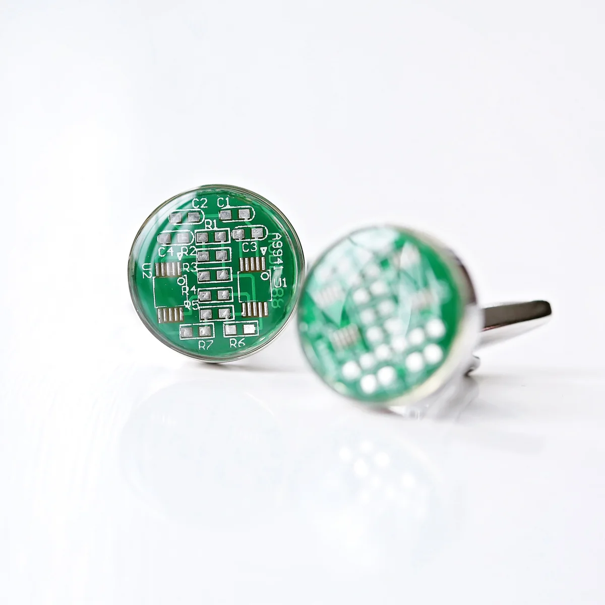 Pair of unique tech cufflinks made from real circuit board displayed on engraved luxury presentation box