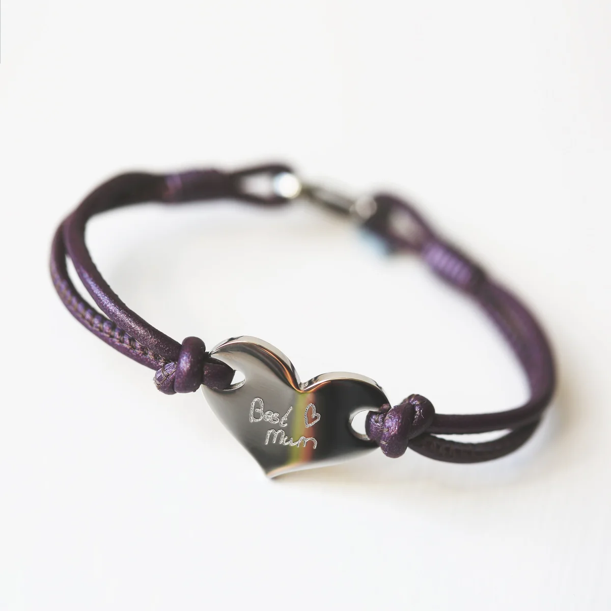 Berry leather silver heart bracelet with engraved handwriting detail, shown on a white background with gift box nearby