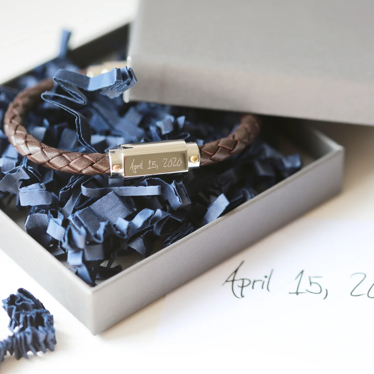 Twisted leather bracelet with personalised handwriting engraving and magnetic snap-lock clasp in stainless steel finish