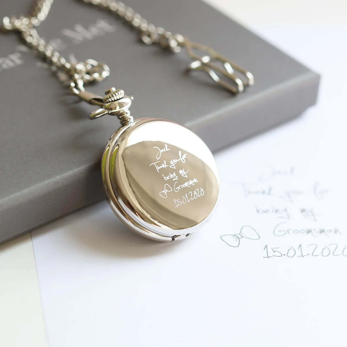 Mechanical wind-up watch with skeleton view and personalised handwriting engraving on front and back, 47mm wide pocket watch