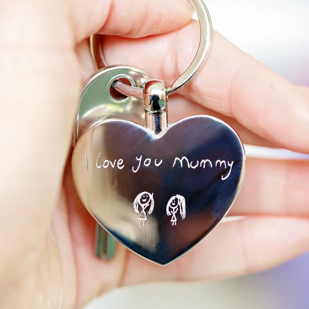 Hearts Forever custom engraved keyring in polished stainless steel with handwriting engraving and gift box with blue zig-zag shred