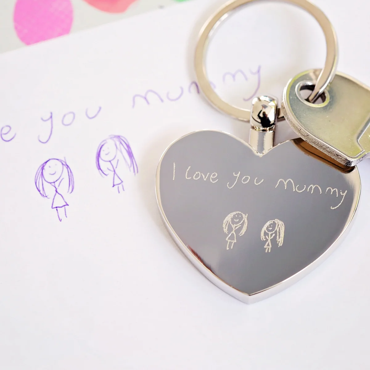 Hearts Forever stainless steel keychain engraved with custom handwriting in polished silver finish with gift box background