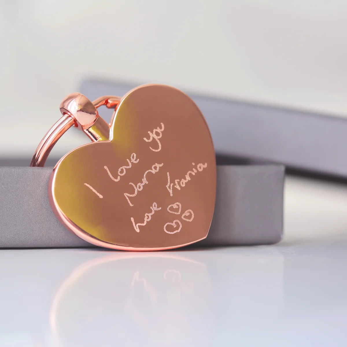 Silver Hearts Forever anniversary gift keyring with custom handwriting engraving displayed on white background