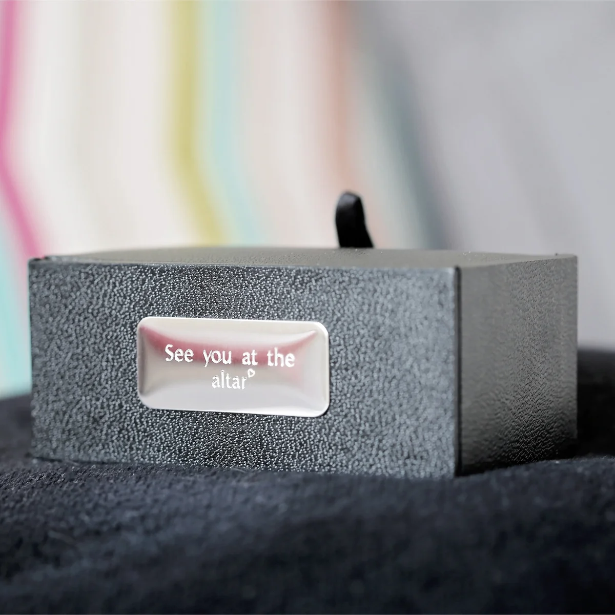 Polished stainless steel unique men's cufflinks with engraved secret message, shown in eco-friendly gift box open