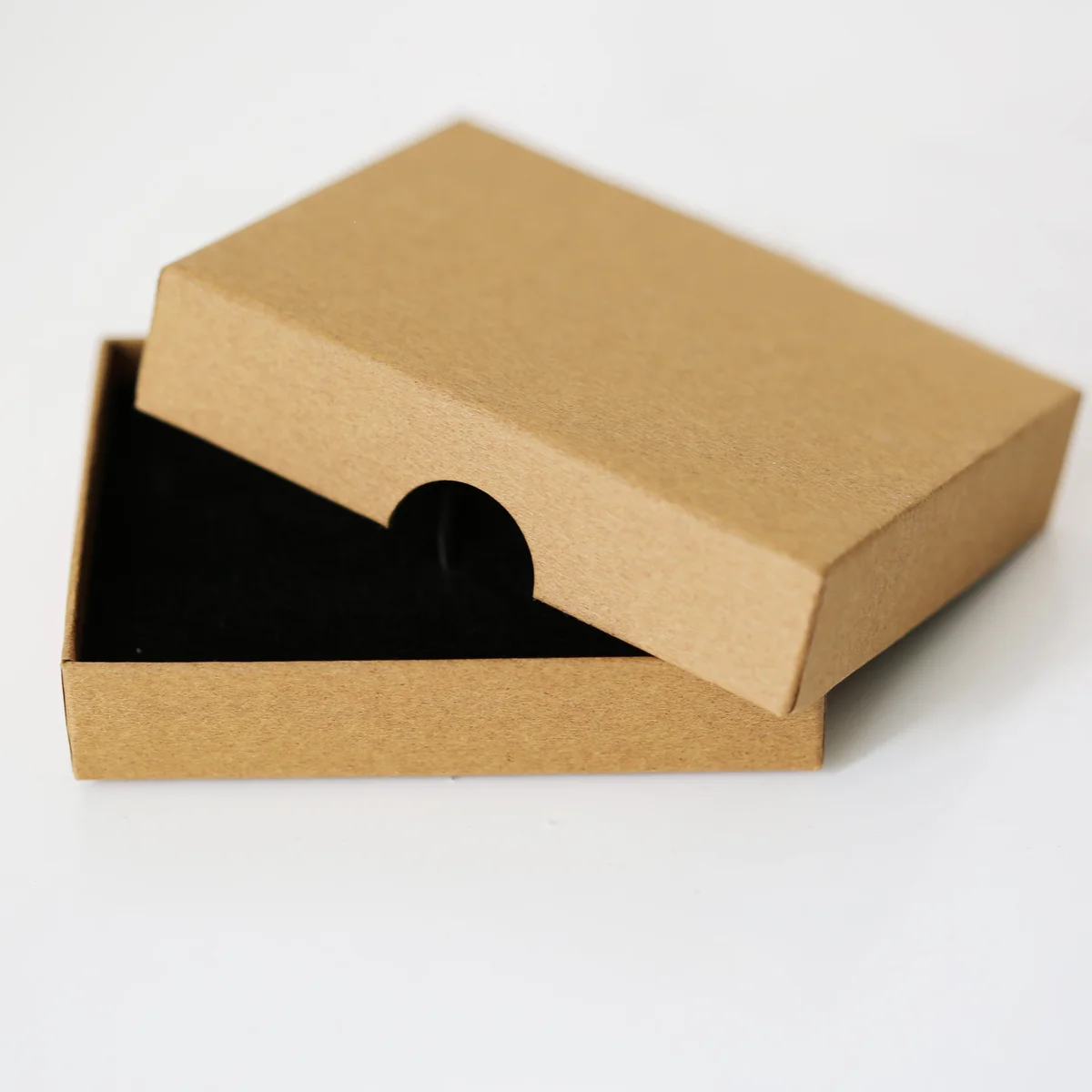Pair of polished stainless steel cufflinks with engraved secret message, displayed in eco-friendly presentation box