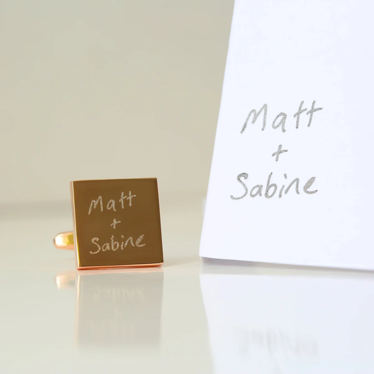 Silver engraved cufflinks featuring personalised handwriting, displayed with eco-friendly gift box, unique gift cufflinks option