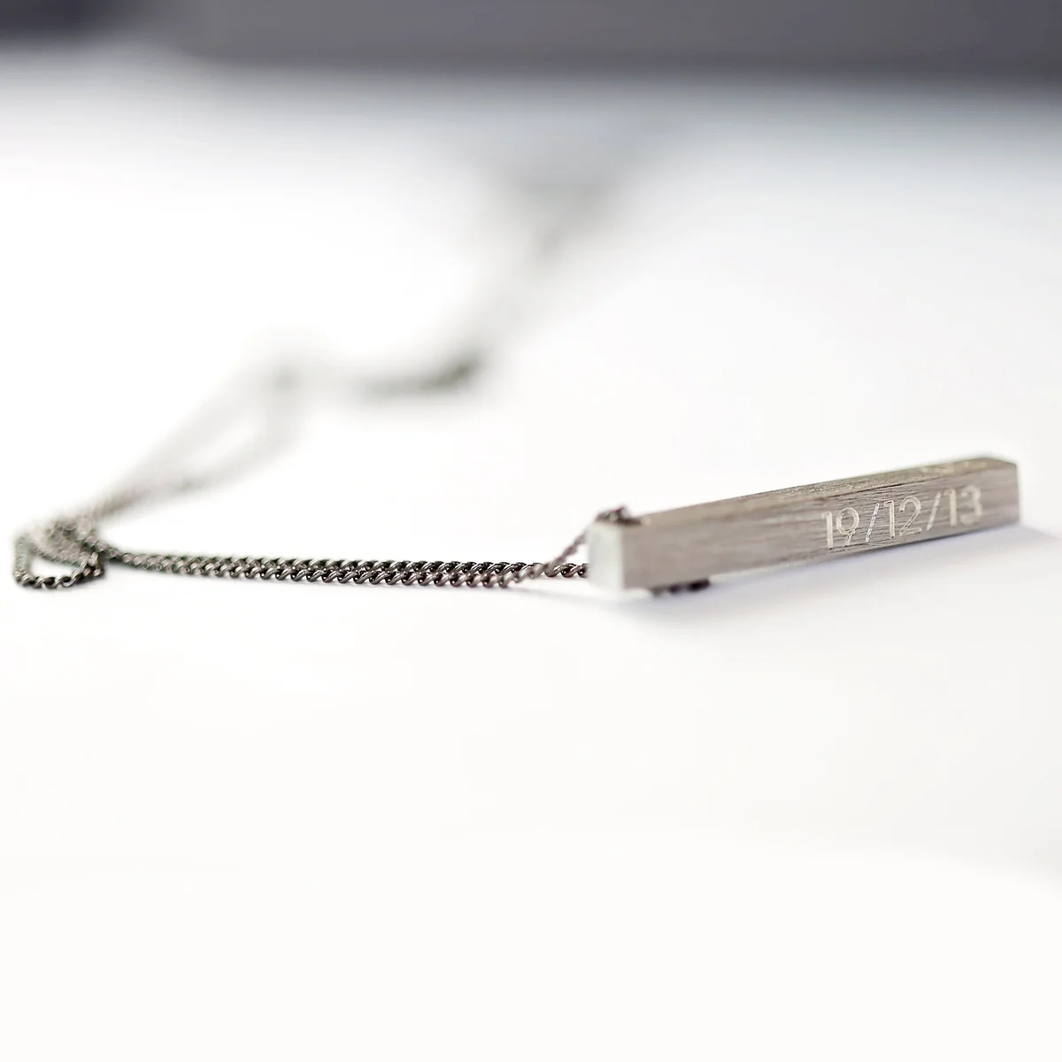 Brushed finish personalised men's necklace with engraving displayed in Wear We Met gift box, custom men's jewellery gift idea