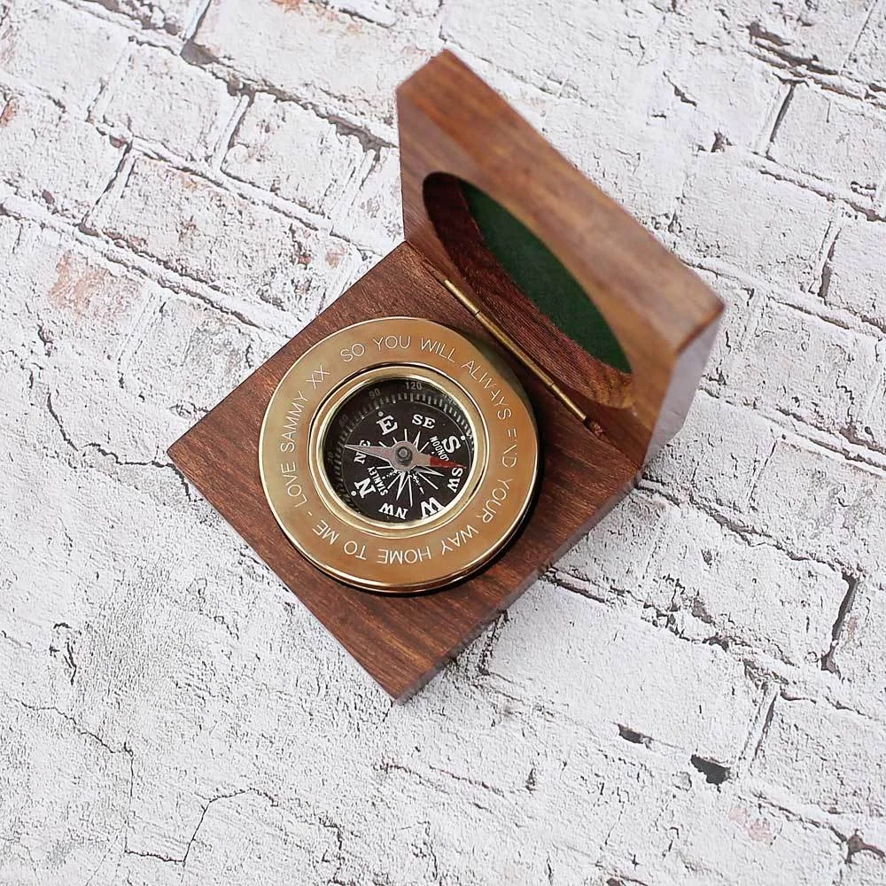 Personalised compass gift in brass with mahogany timber box featuring custom handwriting engraving on the lid
