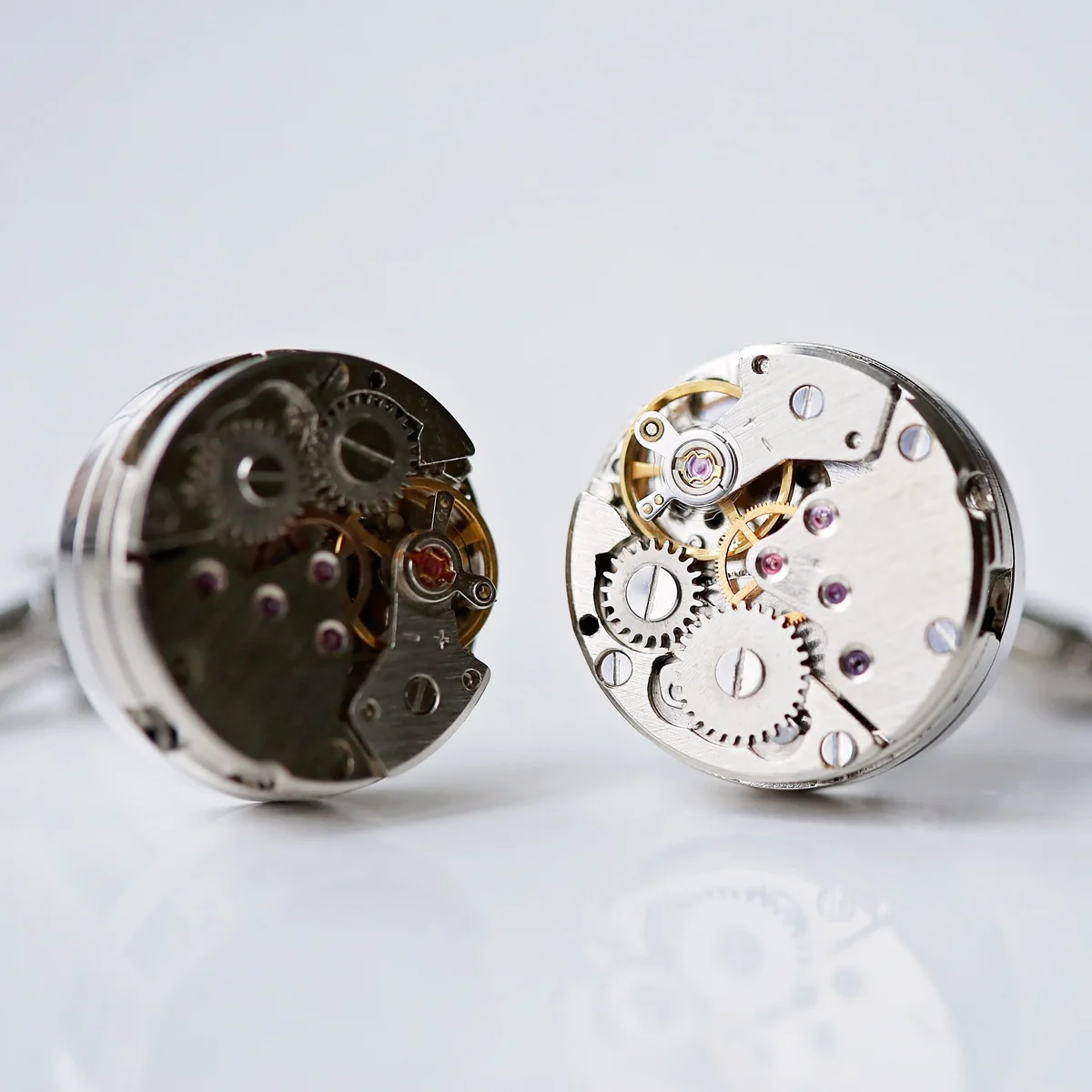 Pair of stainless steel gear movement cufflinks with visible moving parts, ideal engineer gift cufflinks in engraved box