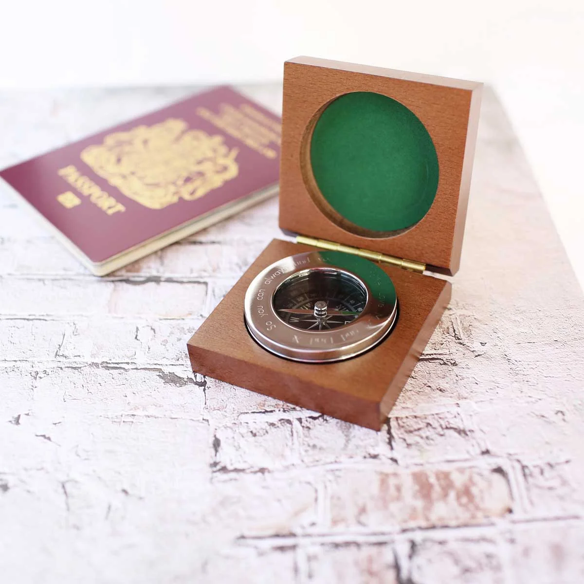 Personalised brass compass with modern font engraving inside open mahogany timber box with monogrammed plate and ribbon gift box