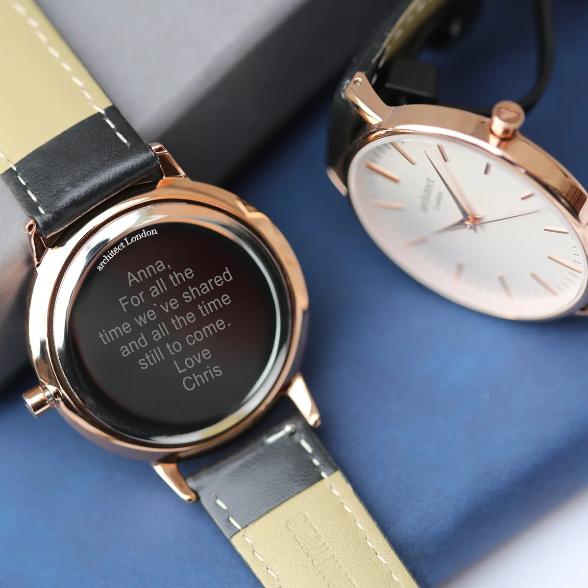 Rose gold ladies watch with black leather strap watch, minimalist dial and polished stainless steel case on white background