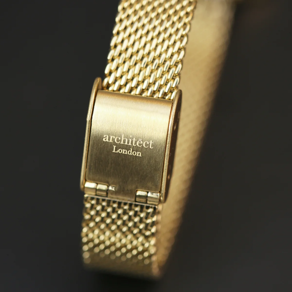 Ladies gold mesh strap watch with minimalist dial and personalized handwriting engraving on the back, in luxury box