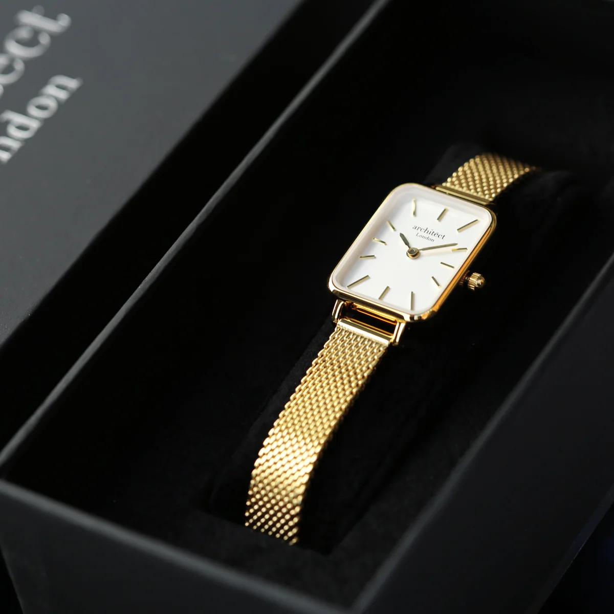 Gold mesh strap engraved wristwatch with minimalist dial and personalised handwriting engraving on stainless steel case back