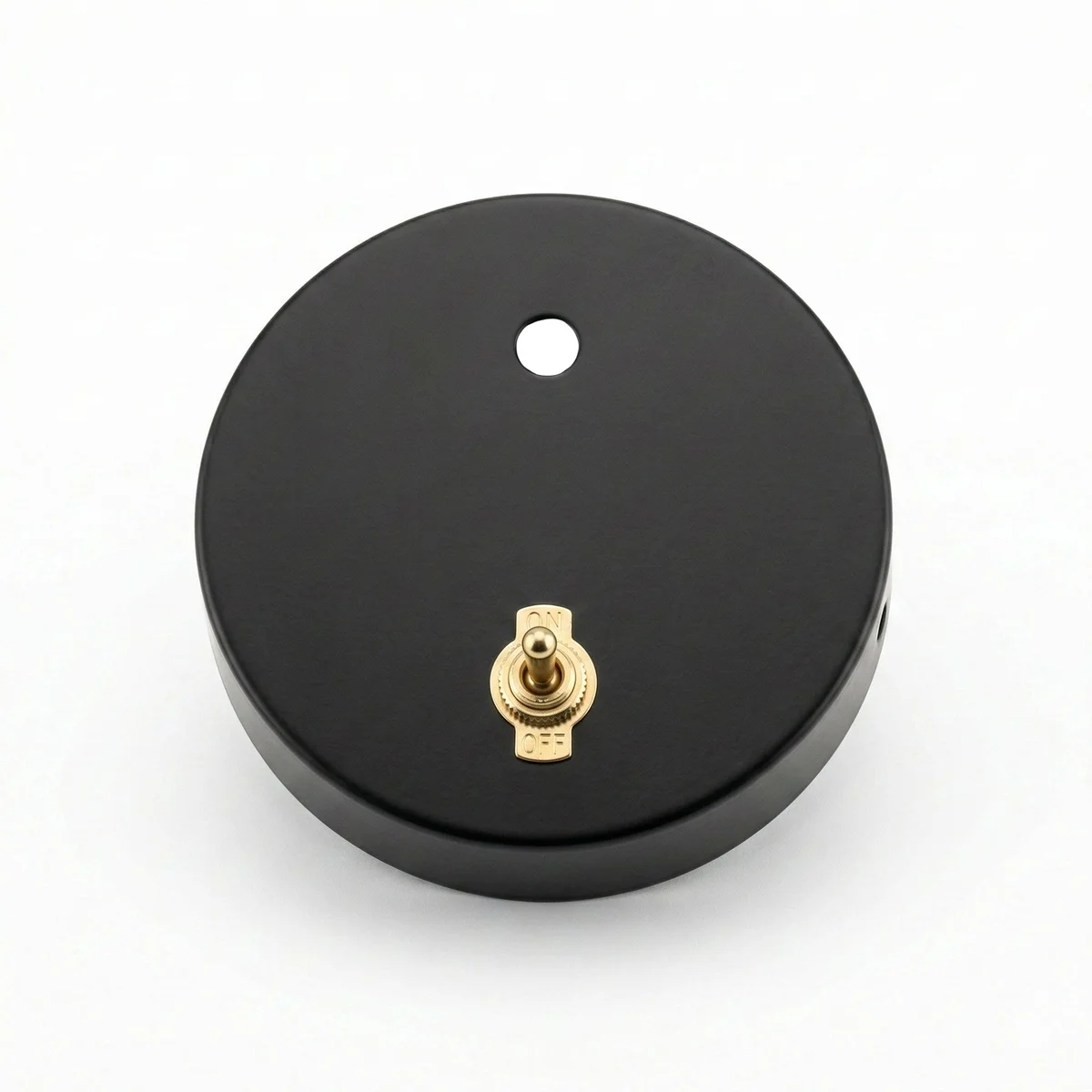 Black 120mm ceiling rose with brass toggle switch and pre-wired leads for easy ceiling or wall mounting