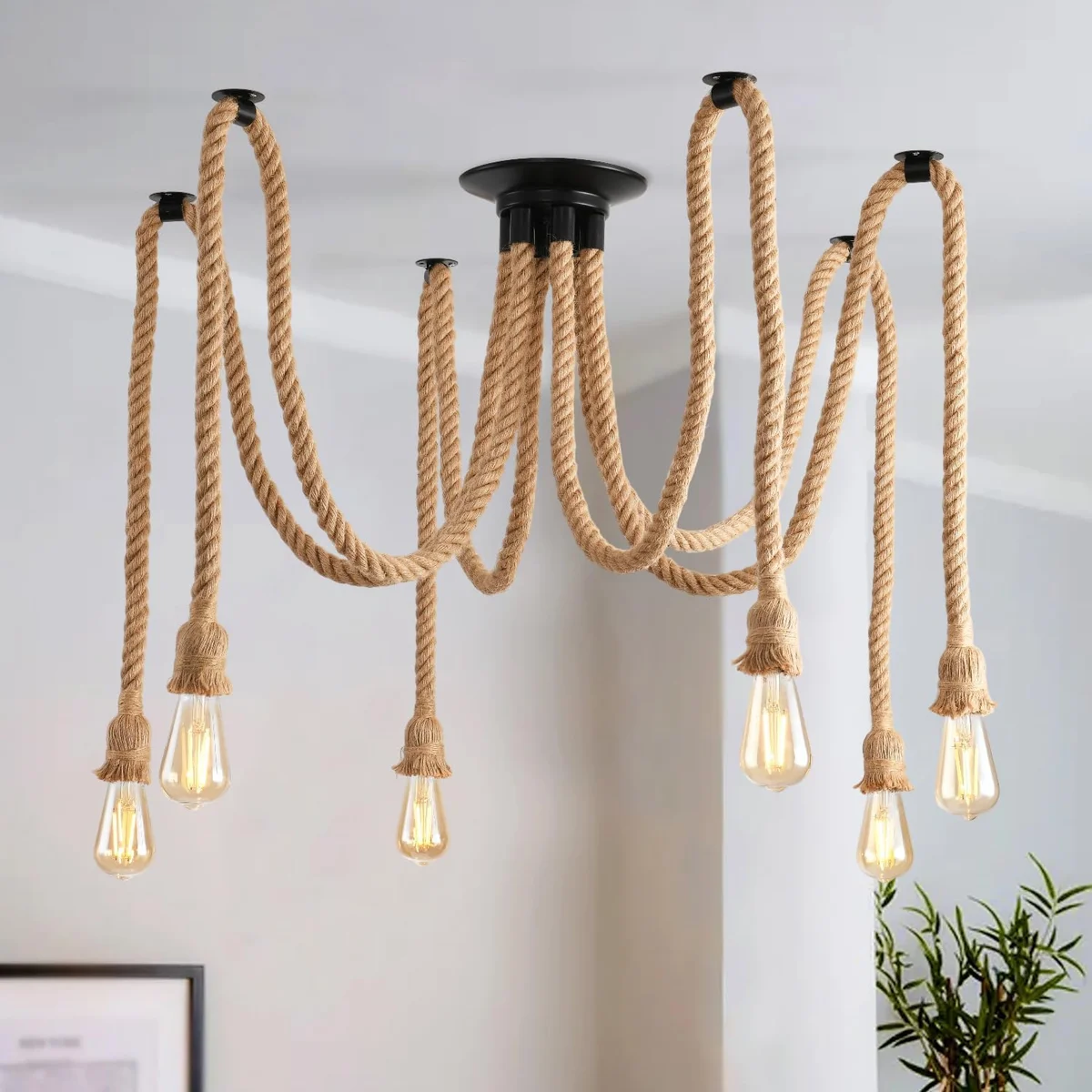 Industrial spider-shaped pendant light with metal cage shades, hemp rope, and E27 LED bulb compatible socket hanging indoors