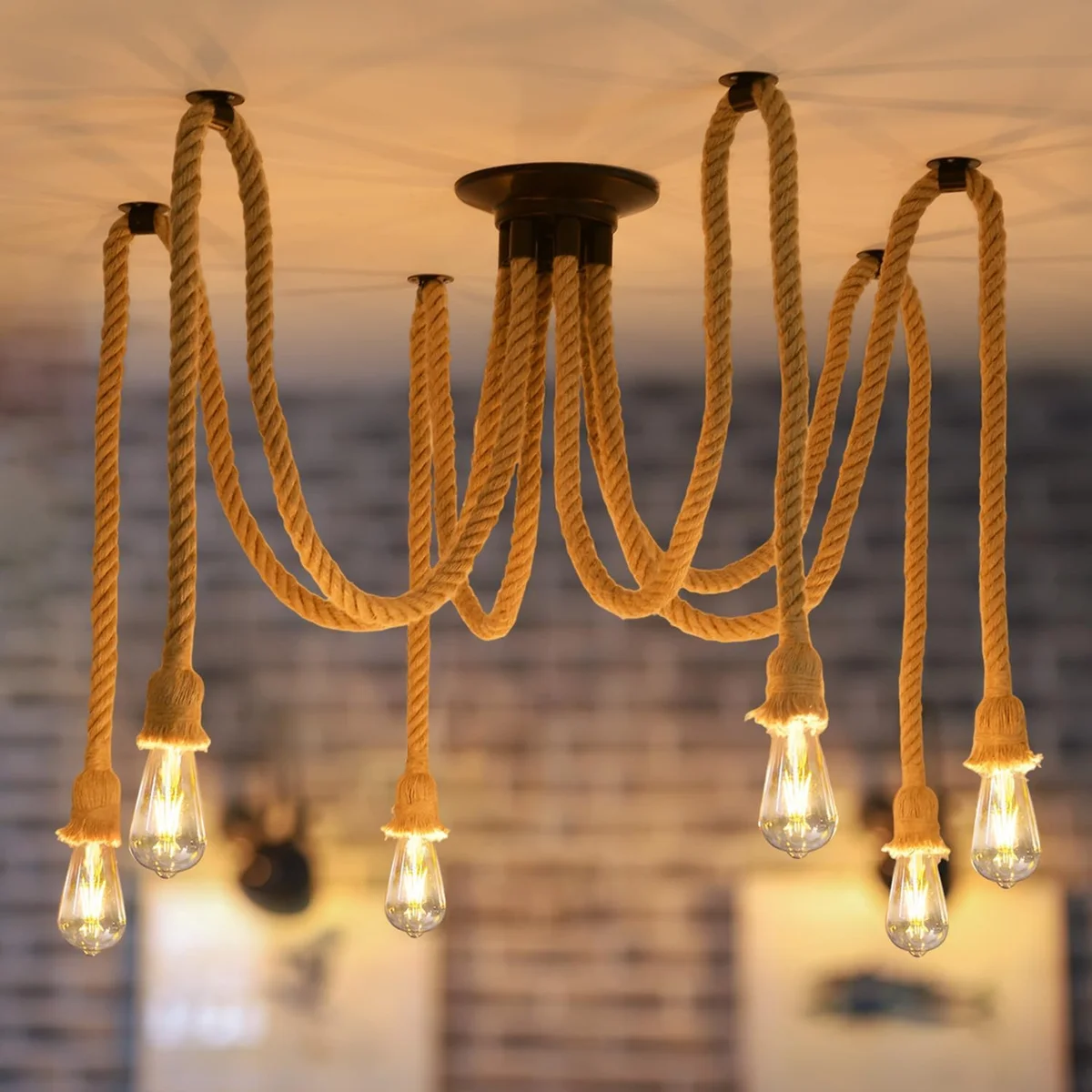 Industrial spider-shaped indoor hanging light with metal wire cage shades and adjustable hemp rope suspension