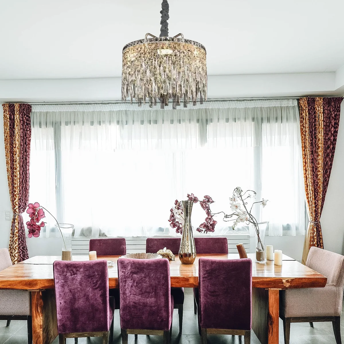 Round modern gold chandelier with clear crystal drops, ceiling mounted, showcasing elegant frame and lighting fixture details