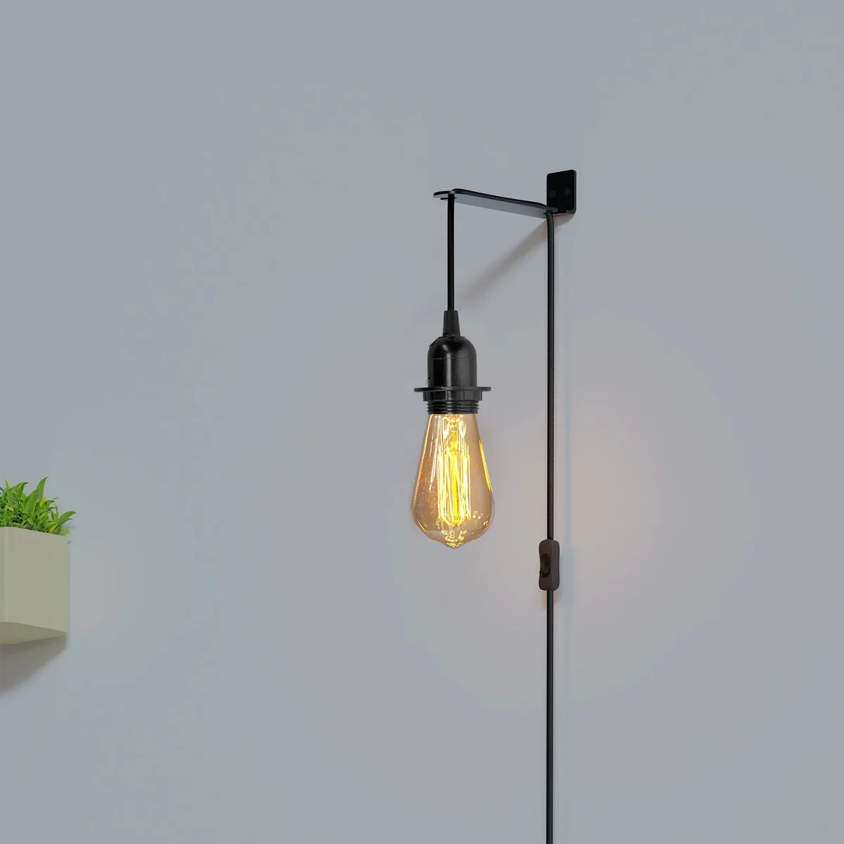 Black E27 pendant light kit with 2m cord, inline switch, UK plug, and metal PVC finish hanging against white background