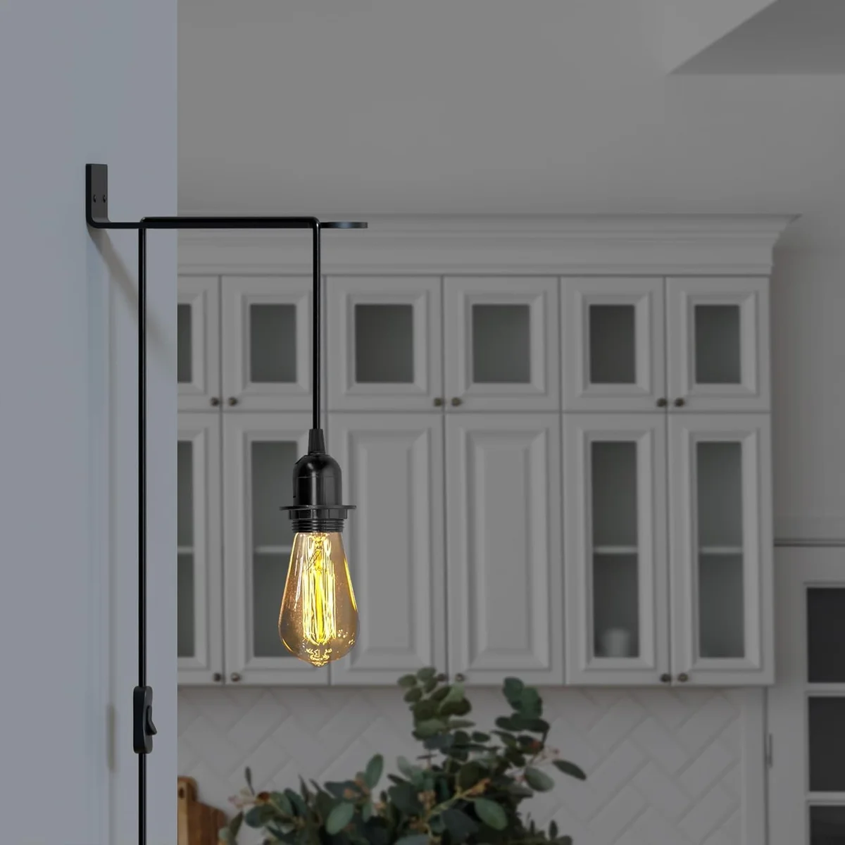 Black plug-in pendant light fitting UK with inline switch, E27 socket, and 4.5m cord hanging from ceiling